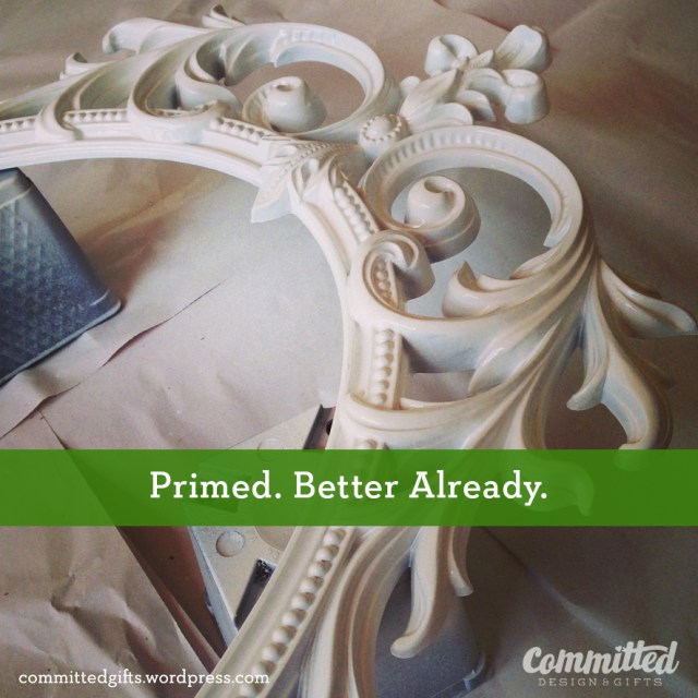 Painting an ornate frame.